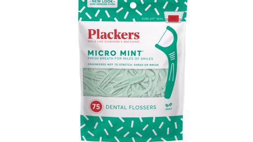 Placker's new packaging: mint green and white flossers.