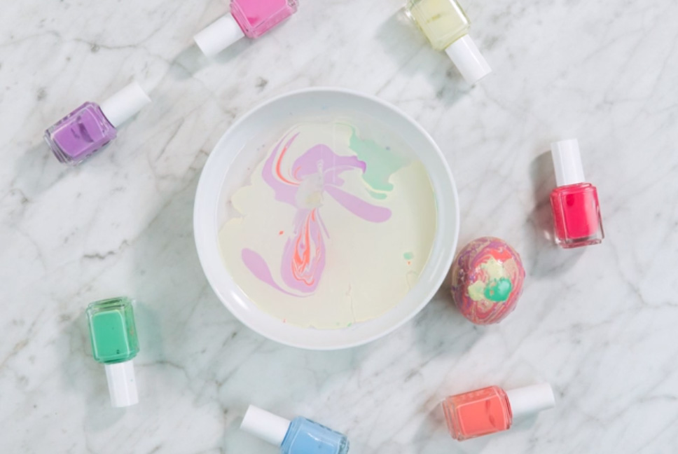 Nail polish is the perfect tool to marble your eggs. Just put a few drops of your favorite colors into water and swirl your egg around to make a beautiful design.