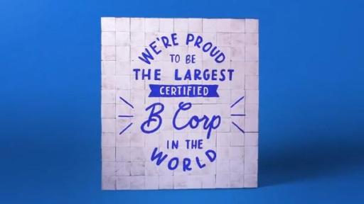 White blocks with text: We're proud to be the largest B corp in the world
