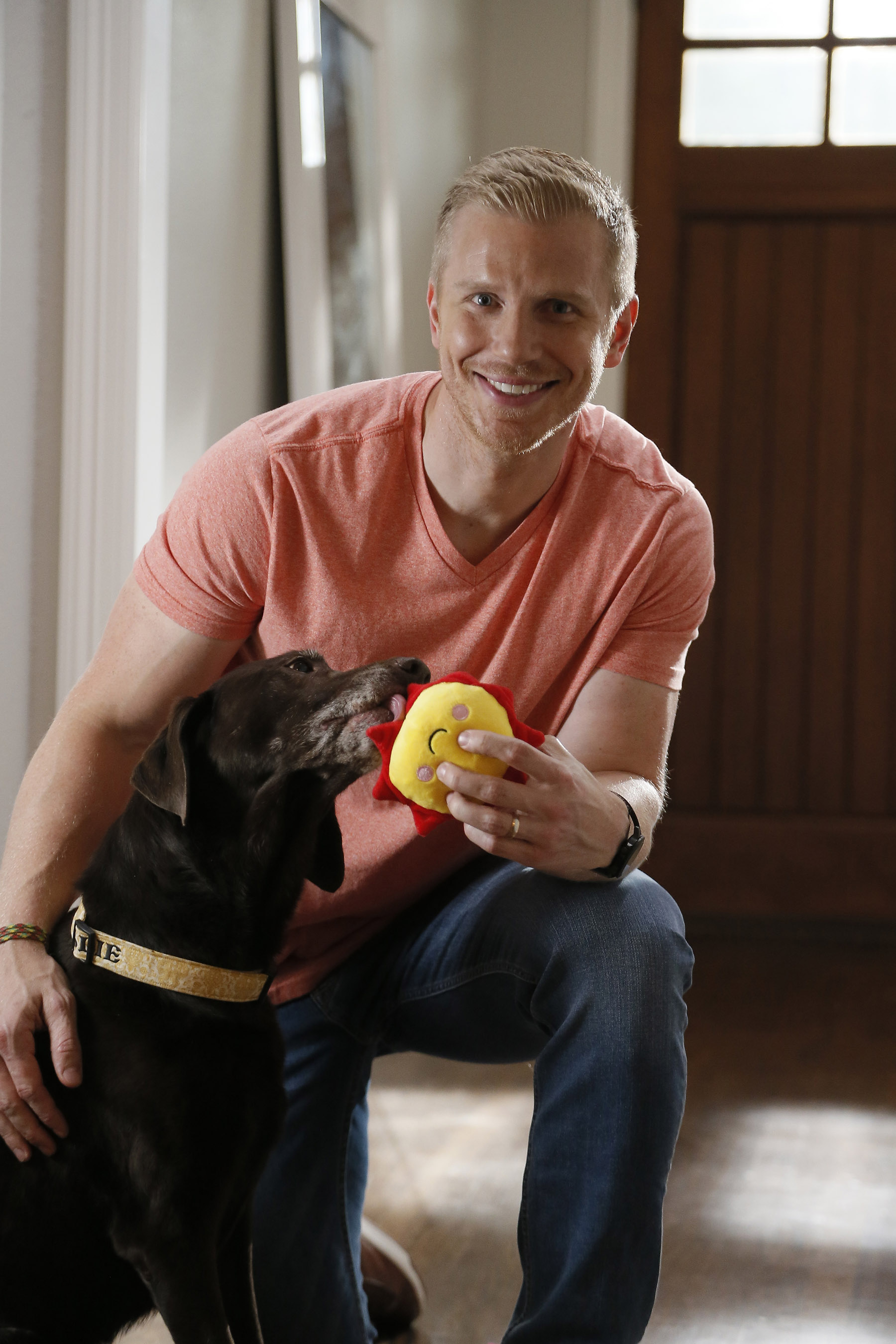 TV personality and Hurricane Harvey responder Sean Lowe plays with his beloved dog, Ellie, and her favorite toy while filming a public service announcement (PSA) on pet disaster preparedness with the Banfield Foundation at his home in Dallas, Texas. The PSA debuted nationally on Wednesday, June 6, 2018 and educates pet owners on the importance of including pets in disaster planning. (Photo credit: Brandon Wade/AP Images for the Banfield Foundation)