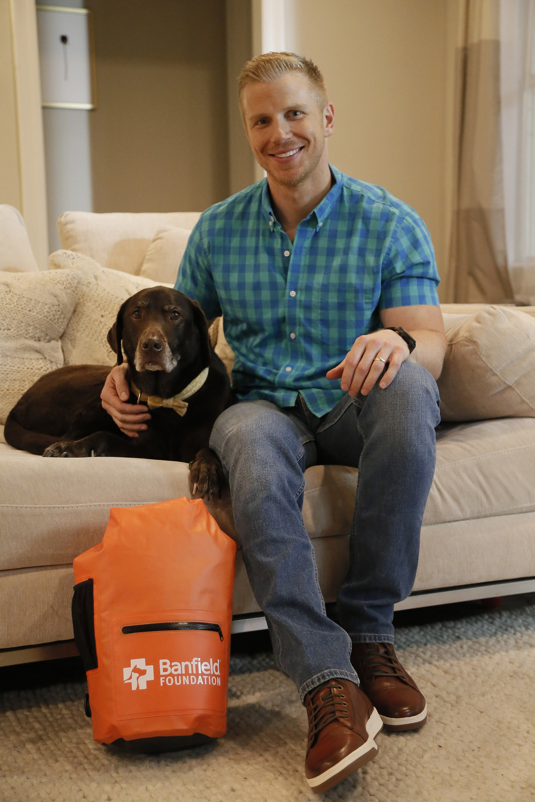 In advance of hurricane season, TV personality and Hurricane Harvey responder, Sean Lowe, films a public service announcement (PSA) on pet disaster preparedness with the Banfield Foundation and his dog Ellie at their home in Dallas, Texas. The PSA debuted nationally on June 6, 2018 and educates pet owners on the simple yet potentially life-saving steps they can take for their four-legged family members before disaster strikes. (Photo credit: Brandon Wade/AP Images for the Banfield Foundation).