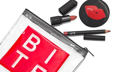 Bite Beauty products scattered outside a carrying bag