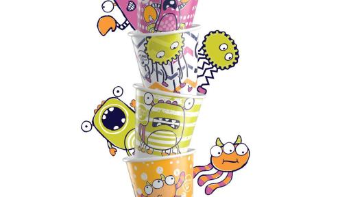 A stack of Dixie cups with designs of colorful monster characters.