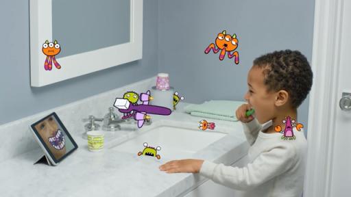 Video of a kid playing the new Dixie Molar Monsters augmented reality app while brushing his teeth.