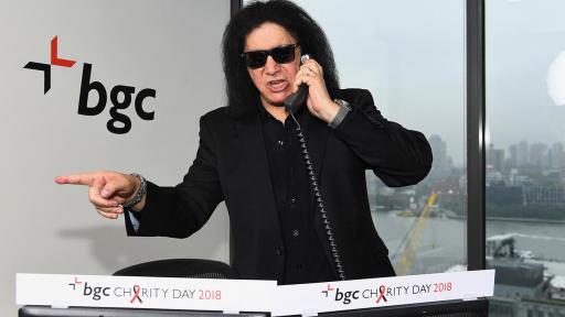 Gene Simmons answers phones for BGC Charity Day 2018 event