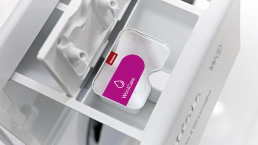 Miele offers the CapDosing system capsule is placed into the fabric conditioner compartment.