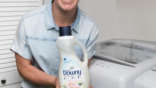 Olympic Gold Medalist Jamie Anderson Displaying a Bottle of Downey