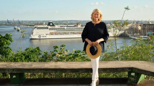 Martha Stewart in front of ship