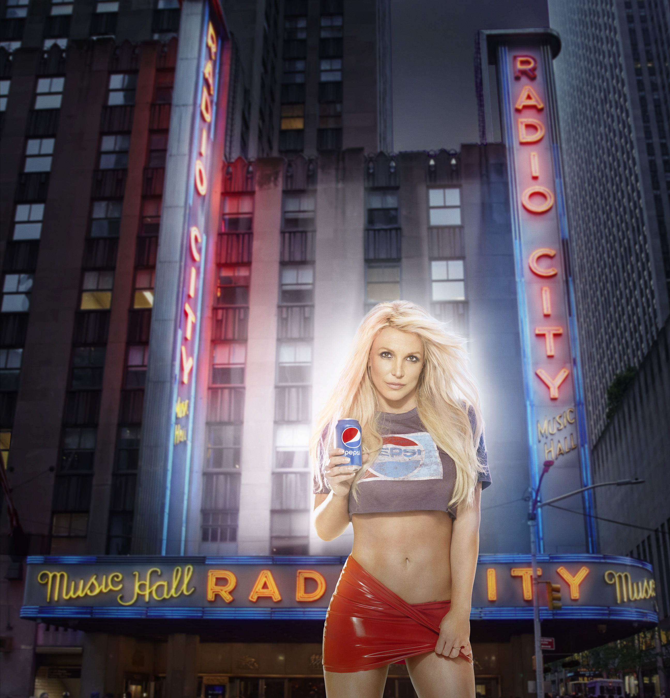 In honor of the historic partnership announcement between The Madison Square Garden Company and PepsiCo, longtime Pepsi musical artist Britney Spears pictured here in front of Radio City Music Hall.