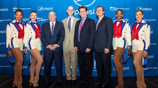 L-R: Radio City Rockettes Sam Berger and Tiffany Billings; NHL Deputy Commissioner Bill Daly; NBA Commissioner Adam Silver; PepsiCo North America CEO Al Carey; The Madison Square Garden Company President Andy Lustgarten; Radio City Rockettes Danelle Morgan and Taylor Shimko standing for a photo.