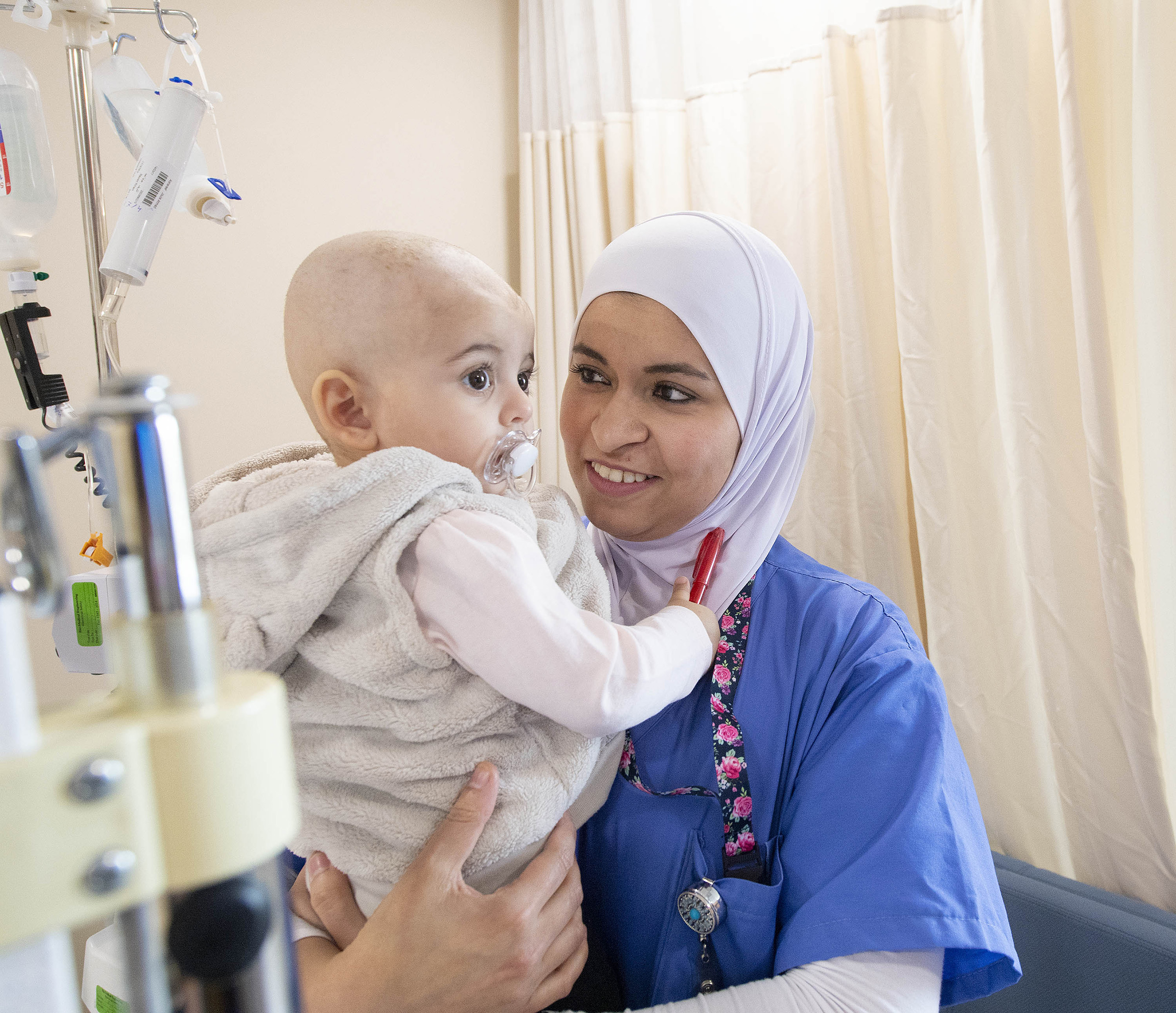 This patient and nurse were photographed in King Hussein Cancer Center in Amman, Jordan, a St. Jude Global partner site that has seen immense success with retinoblastoma cure rates for patients. Please credit St. Jude Children’s Research Hospital for use of this photo.