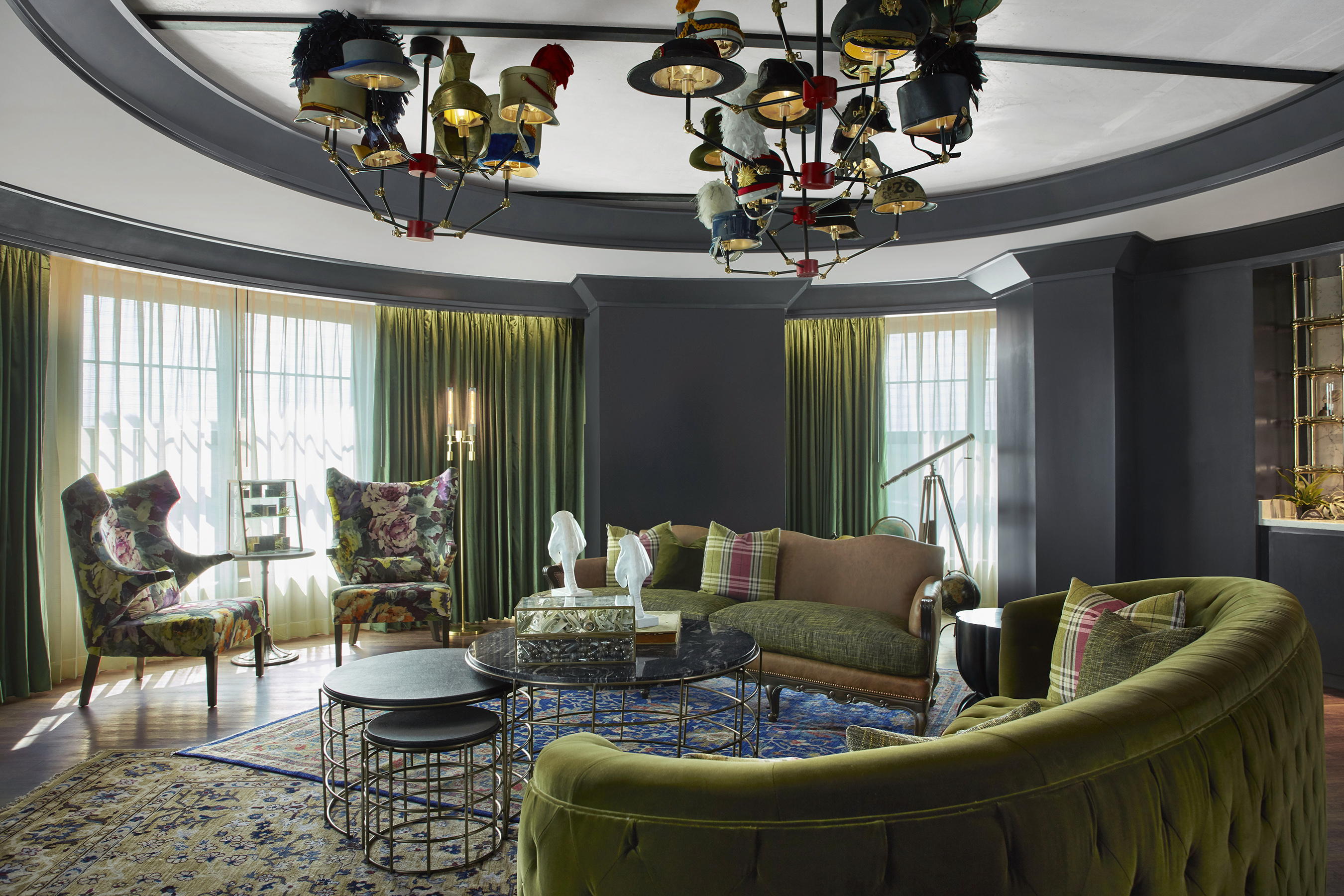 MGM Springfield’s whimsical Presidential Suite features a chandelier adorned with hats.