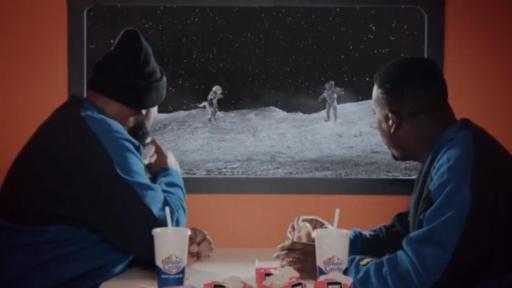 Wu-Tang eating Impossible™ Sliders looking out at a moonscape.