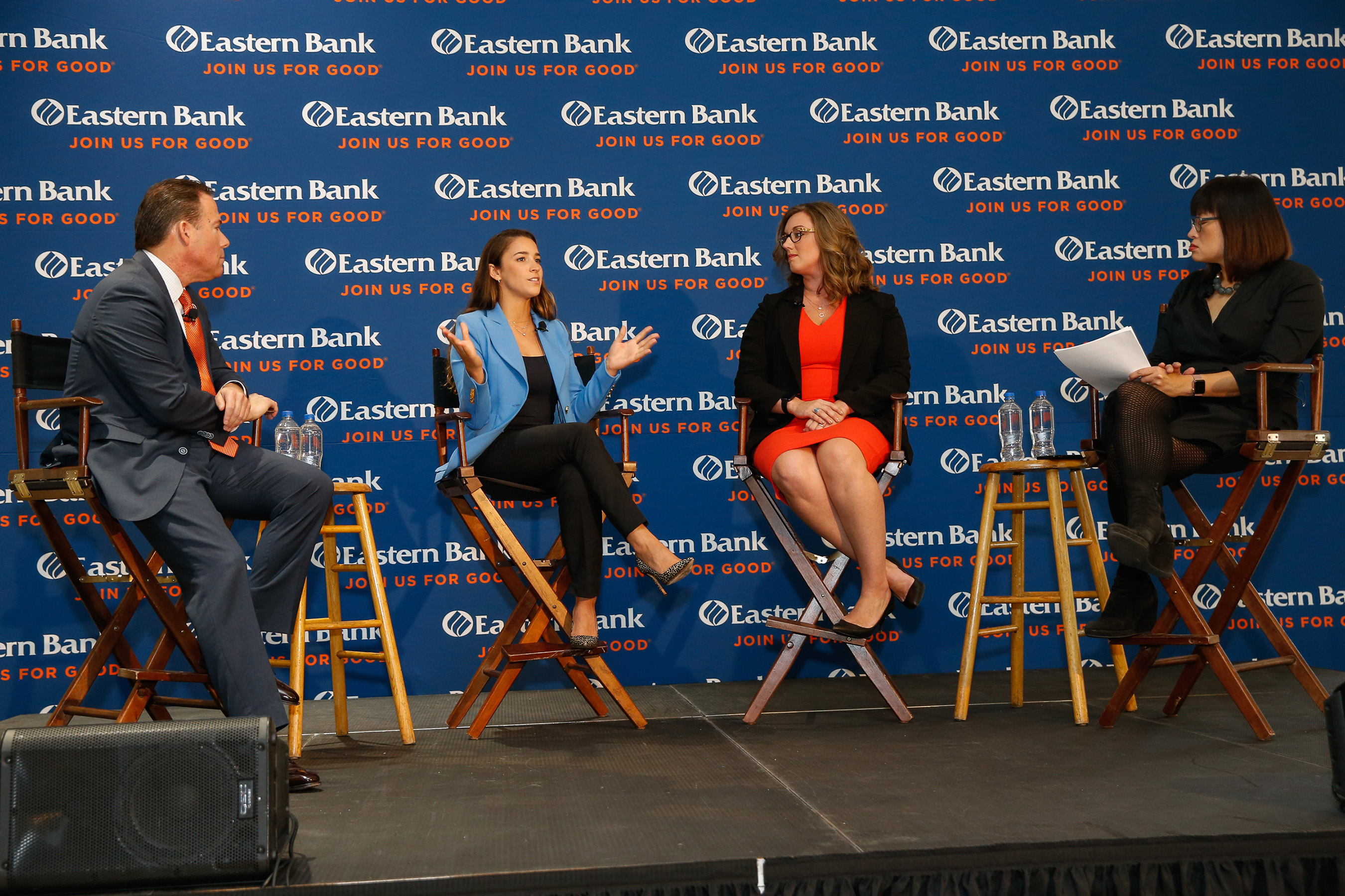 Bob Rivers, Aly Raisman, Katelyn Brewer and Shirley Leung discuss child sexual abuse and prevention training during an event at Eastern Bank headquarters in Boston on October 16, 2018.