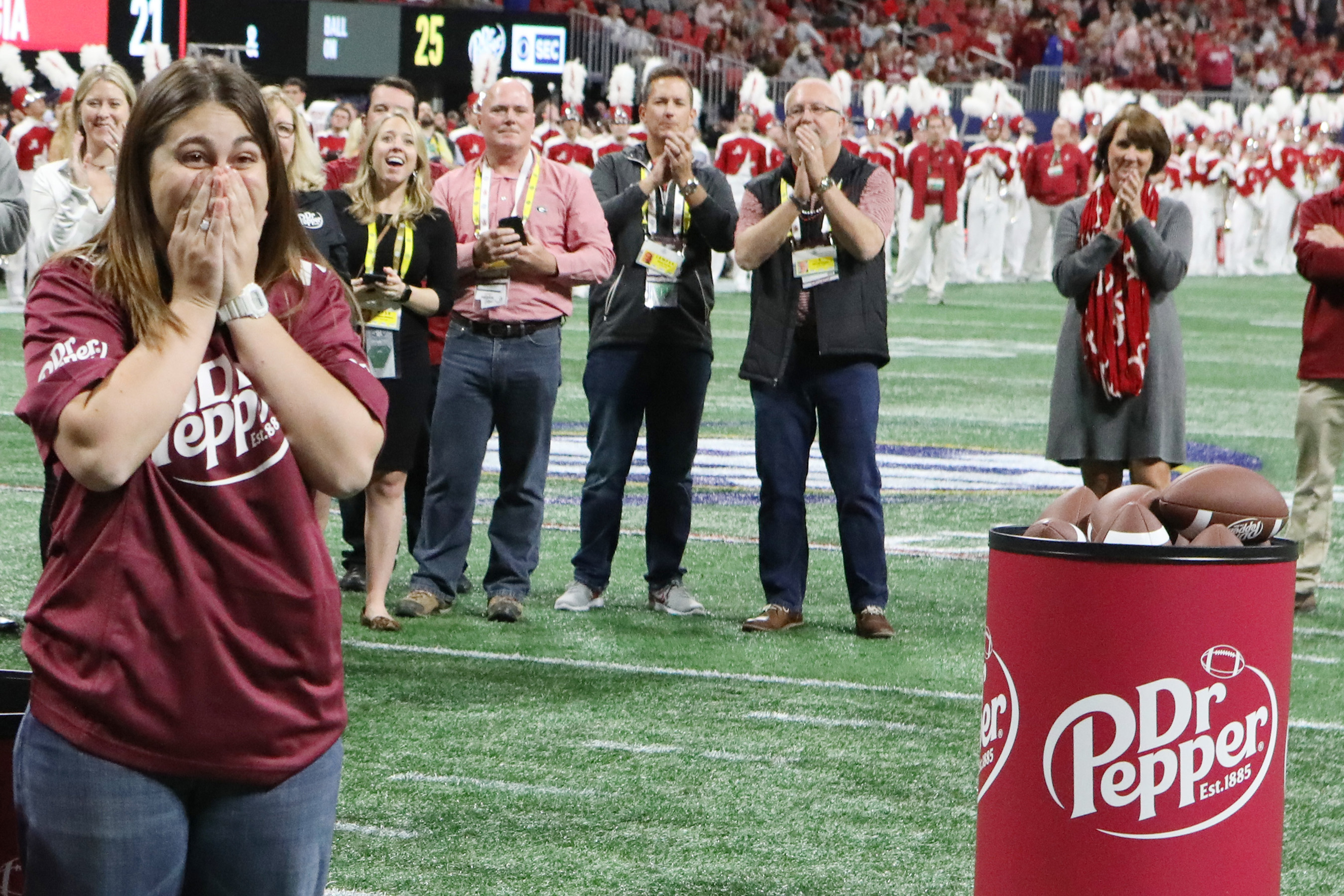 Alina Scarlett is in shock after winning $100,000 in tuition after competing in the Dr Pepper Tuition Giveaway during halftime of the SEC Conference Championship