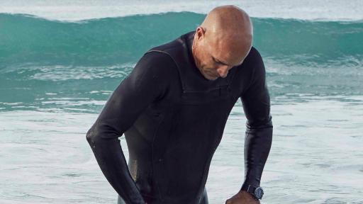 Breitling Surfers Squad member Kelly Slater wearing his Superocean Héritage II Chronograph 44 Outerknown watch