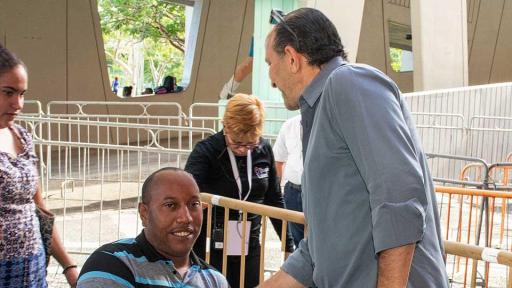 Howard Lutnick, Cantor Fitzgerald Chairman & CEO, greeting a recipient of the Puerto Rico Family Relief Program.
