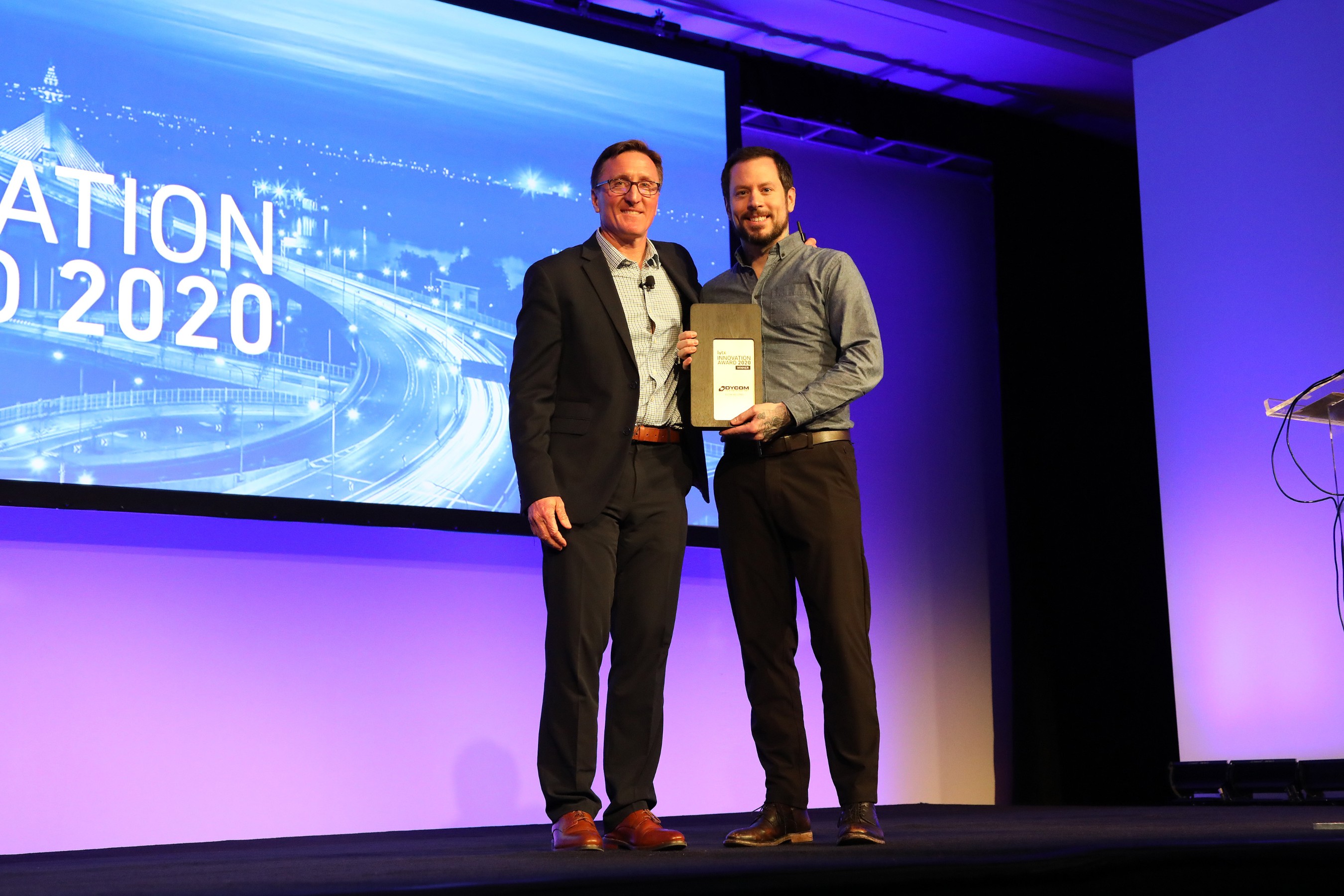 Matt Lovato, Senior Manager, Safety, Dycom Industries, Inc. accepts Lytx inaugural 2020 Lytx Innovation Award from David Riordan, Lytx EVP and Chief Client Officer, at Lytx’s User Group Conference. Dycom is a co-winner of the award, with MV Transportation