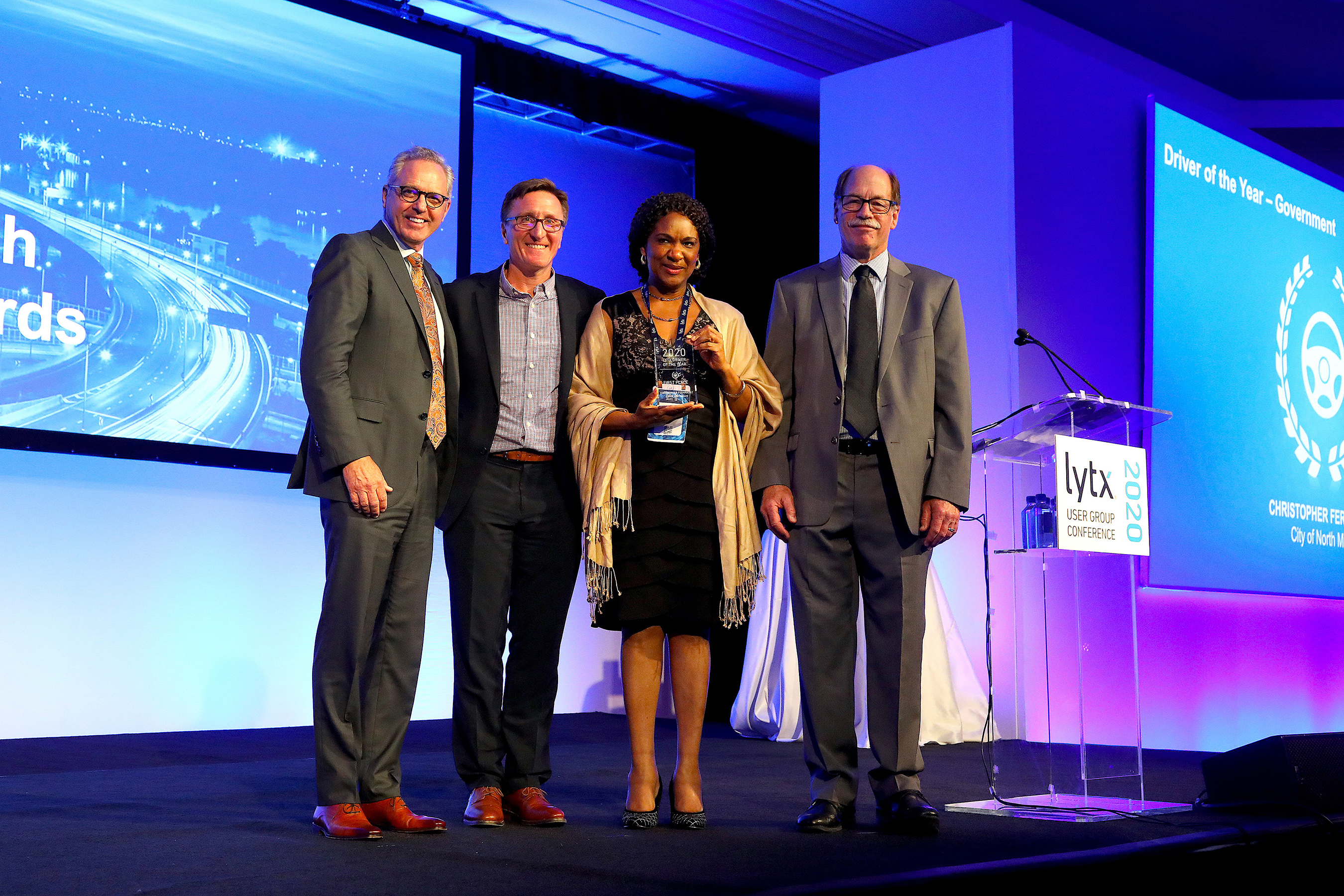 Lytx Driver of the Year, Government Category L-R: Brandon Nixon, Lytx CEO; David Riordan, Lytx EVP and Chief Client Office; Karen Muir, City of North Miami, accepting for Christopher Fernandez; Del Lisk, Lytx VP of Safety Services