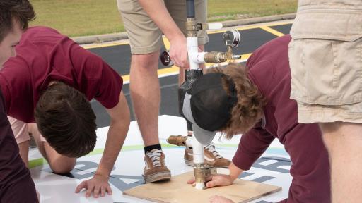 The team from the University of Minnesota prepares to launch their rocket at the 2019 Alka-Rocket Challenge on Thursday.