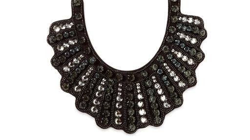 The Banana Republic Dissent Collar, a glass stone and brass jeweled black bib necklace with velvet tie, is available on bananarepublic.com