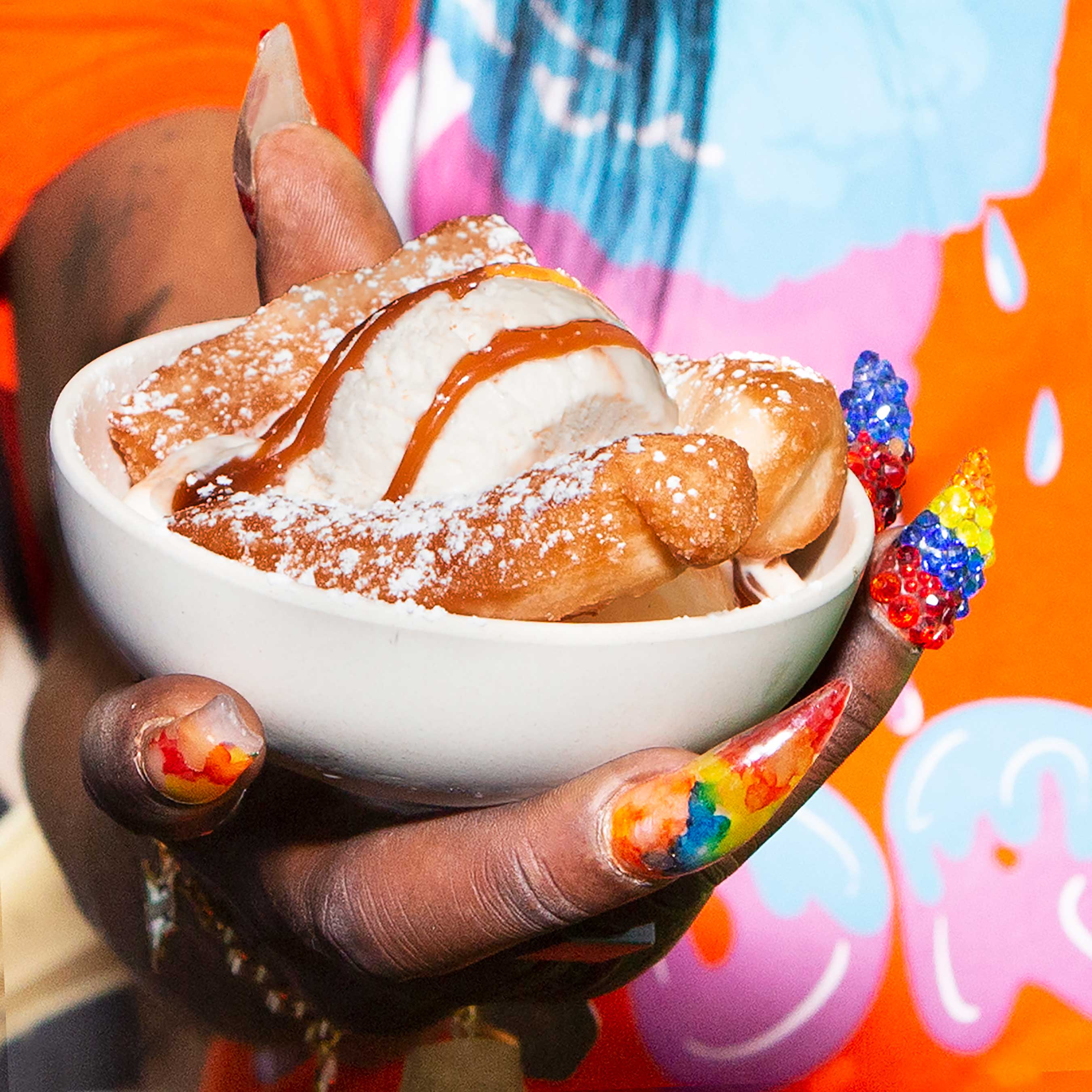 Bouncing Beignets is a vanilla ice cream with a bourbon caramel swirl and was served with beignets.