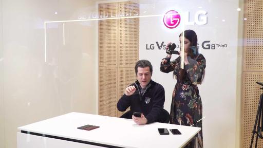 Man using LG smartphone in studio