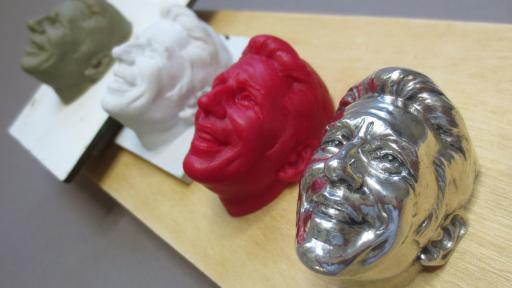 The progression of sculptures of Mario Andretti for the Baby Borg trophy.