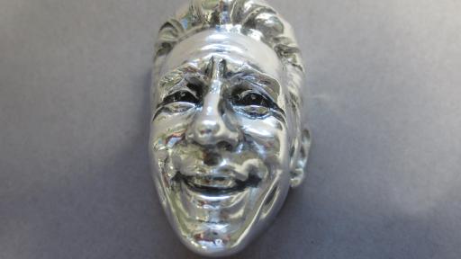 The sterling silver sculpture of Mario Andretti for his Baby Borg trophy commemoration the 50th anniversary of his Indianapolis 500 win.