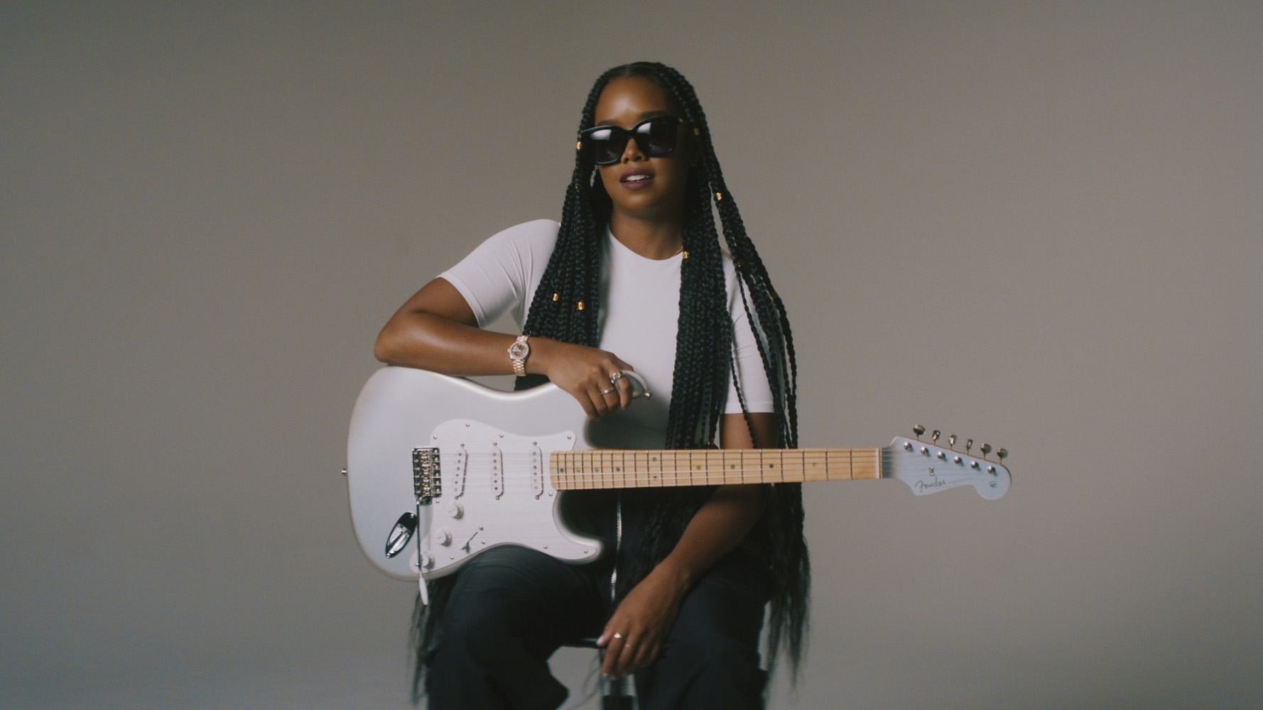H.E.R. Makes History as First Black Female Artist to Have Fender Artist Signature Guitar