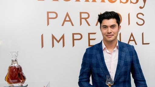 Actor Henry Golding enjoys Paradis Imperial at Hennessy’s “Future of Tradition” event in New York City on June 13, 2019. Announced as official Prestige & Rare Cognac Collection Ambassador, the new partnership will spotlight Hennessy’s Prestige portfolio through the lens of discerning taste and travel, influenced by Golding’s distinctively modern way of looking at the world. The intimate evening also served as the unveiling of a new Paradis Imperial crystal decanter, designed by artist Arik Levy, and an inspired trunk by Louis Vuitton.