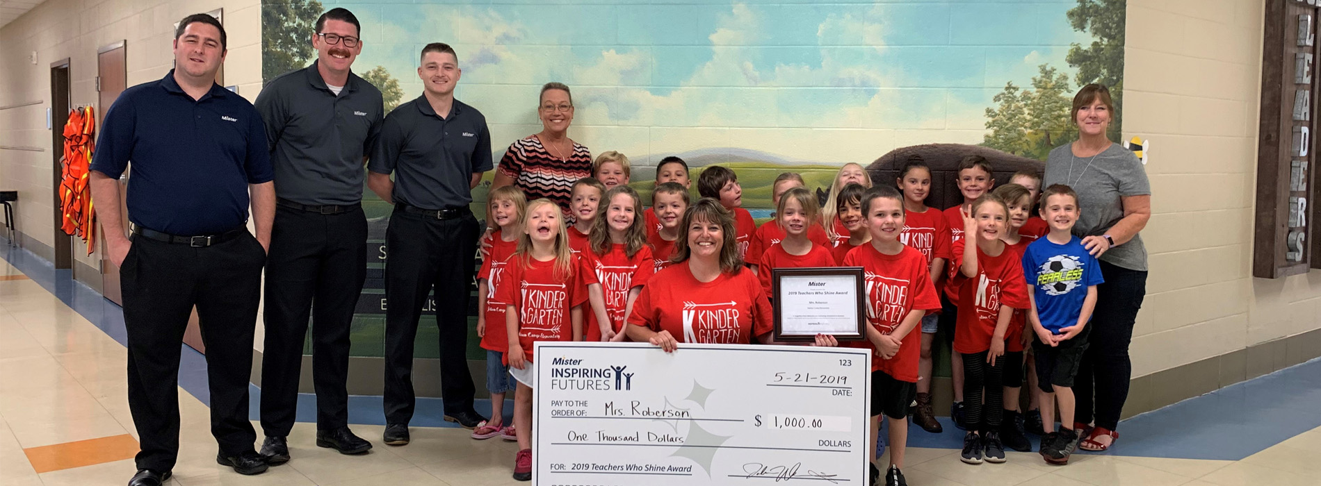 Mrs. Roberson of Station Camp Elementary, Gallatin, Tennessee, celebrates her 2019 Teachers Who Shine award with her class. A teacher for 22 years, Mrs. Roberson says she loves the hugs, laughs, small groups, field trips, projects, student-written letters, and most of all "seeing the light bulb go off” when students get it.