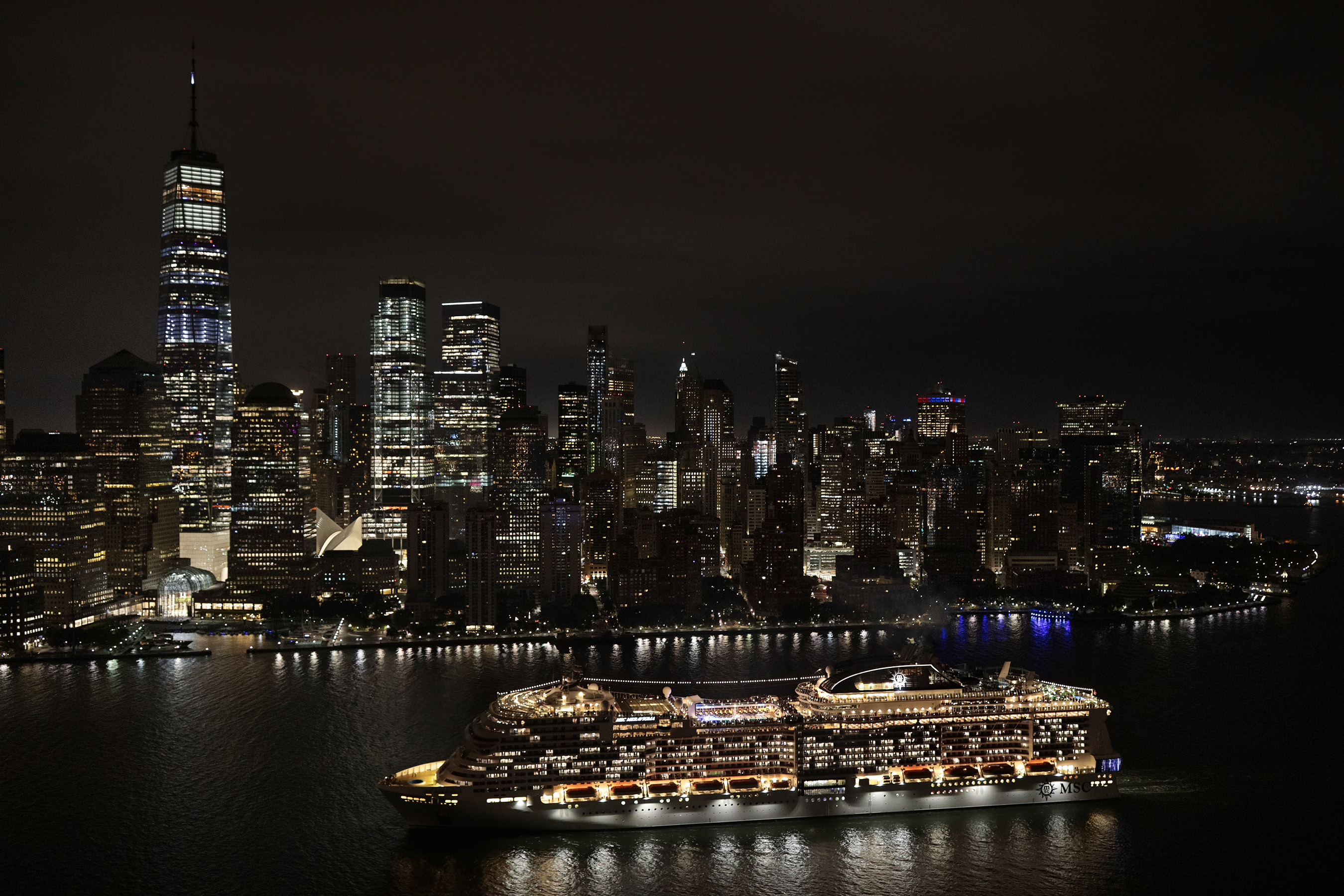MSC Meraviglia arrives to Manhattan Cruise Terminal, cruising by the shimmering NYC skyline as she enters the city.