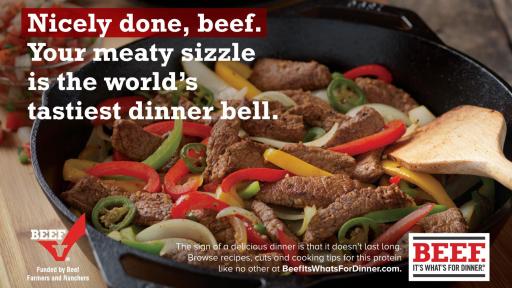 Image of sliced beef with bell peppers and onions in a frying pan. Added words say "Nicely done, beef. Your meaty sizzle is the world's tastiest dinner bell."