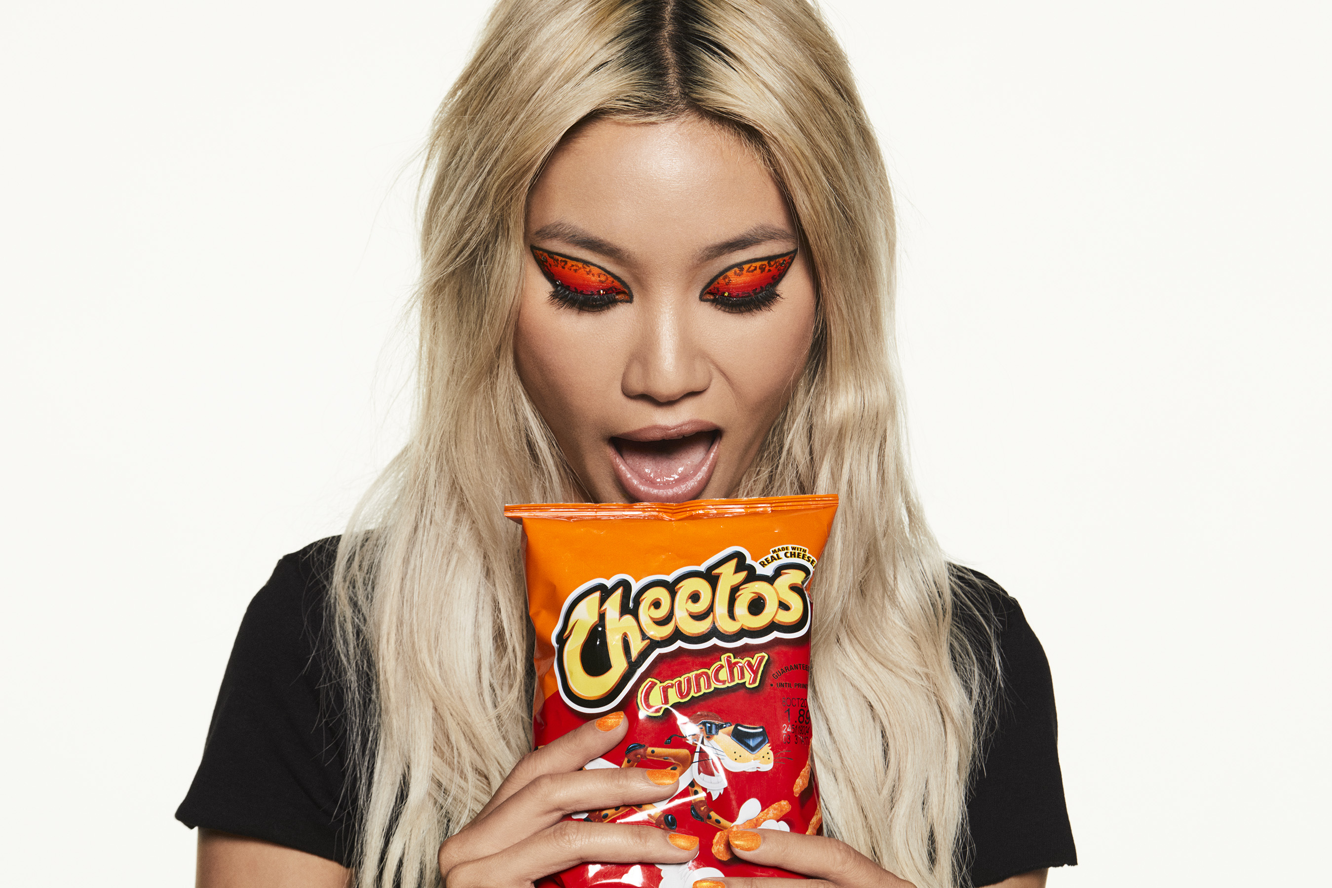 Cheetos puts its orange-dusted fingerprints all over fashion and beauty world with "House of Flamin' Haute"