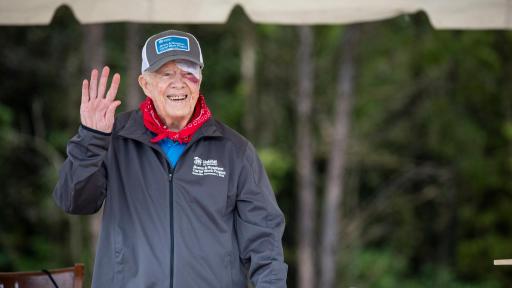 Jimmy Carter waves at viewer