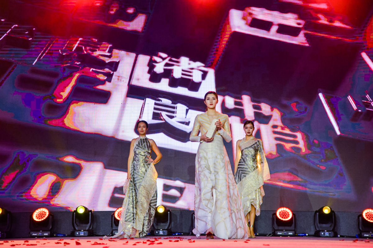 The first roll-out of the Brocade-based Liangzhu Qipao designed by Wu Haiyan