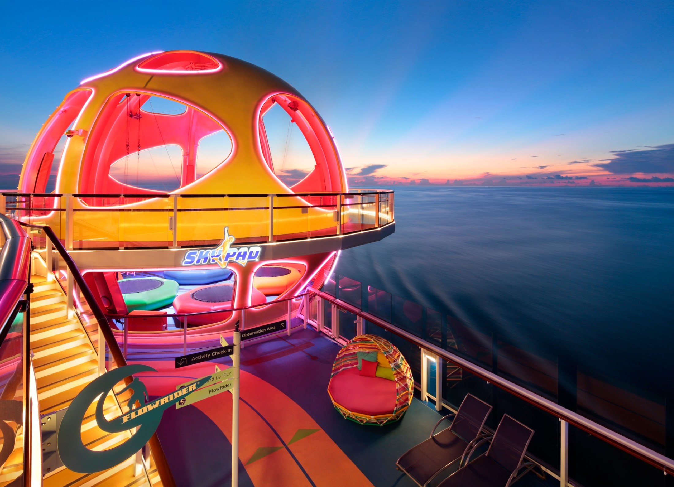 Sky Pad on board Odyssey of the Seas is a virtual reality, bungee trampoline adventure. The experience joins the lineup of thrills on board the ship, which include RipCord by iFly, the skydiving simulator; the FlowRider surf simulator; and the rock climbing wall.