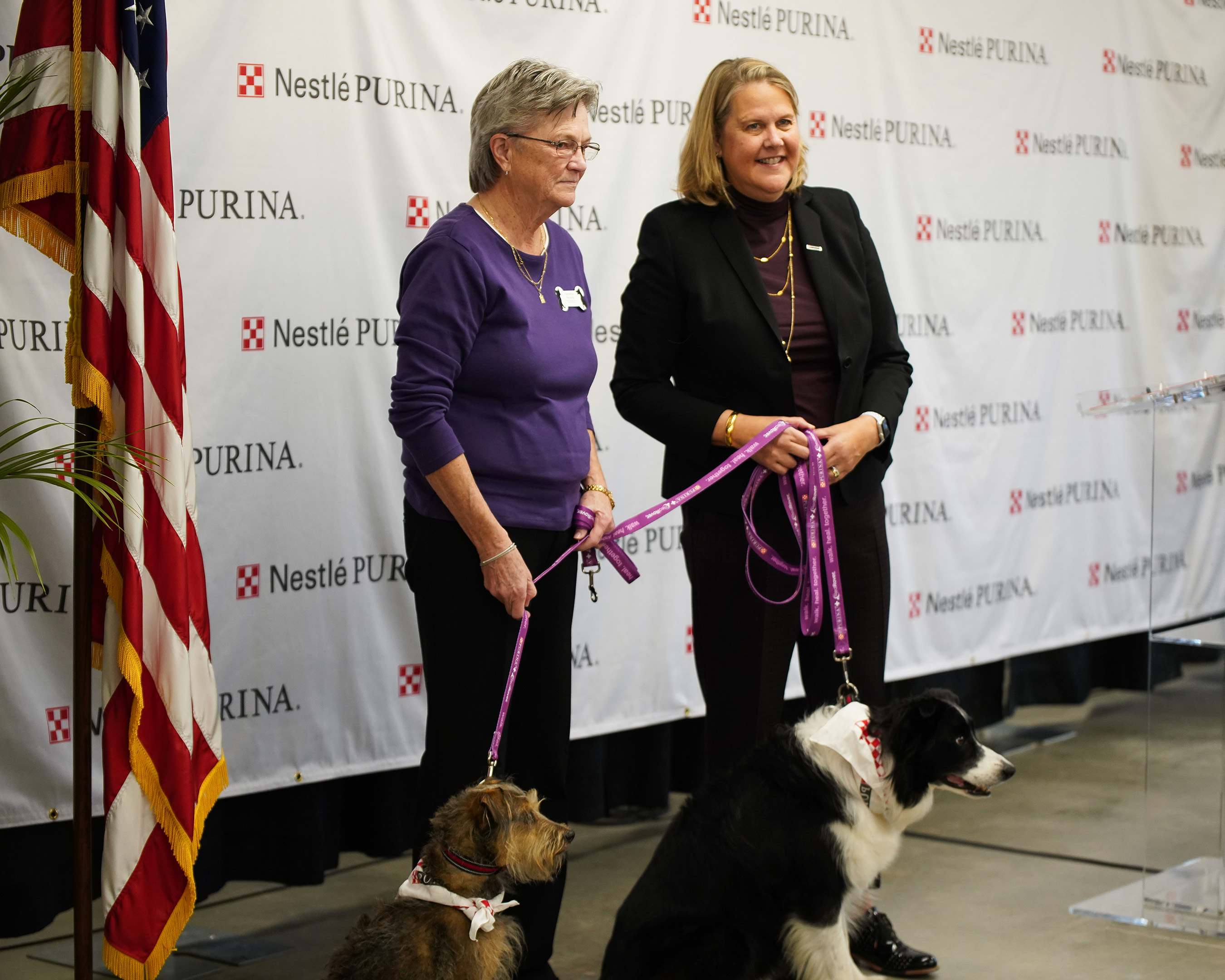 At the grand opening ceremony for Purina’s Hartwell factory, Purina also announced a $20,000 donation to the Northeast Georgia Council on Domestic Violence (NGCDV) as part of its Purple Leash Project, a partnership between Purina and national non-profit RedRover. Pictured left is Katherine Reusing, Executive Director of Northeast Georgia Council on Domestic Violence, and pictured right is Purina President Nina Leigh Krueger.