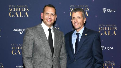 Cigna President and CEO David Cordani and baseball star Alex Rodriguez celebrate the courage of the Achilles International athletes at the Annual Gala.