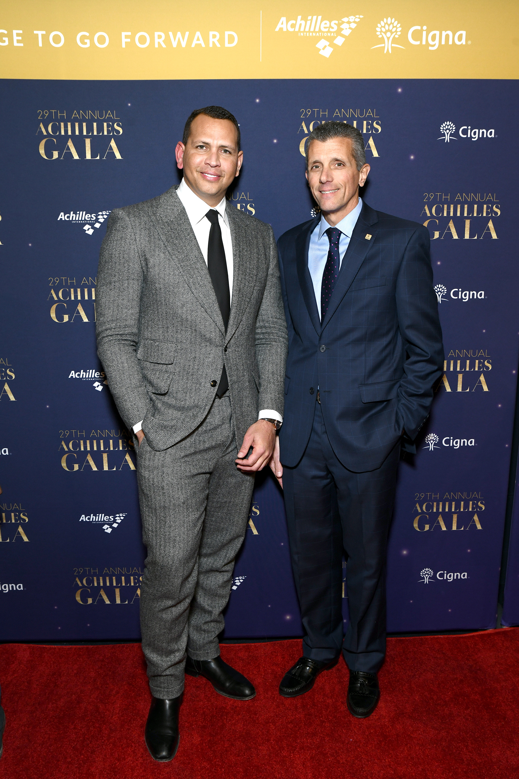 Cigna President and CEO David Cordani and baseball star Alex Rodriguez celebrate the courage of the Achilles International athletes at the Annual Gala.