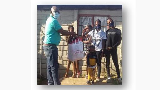 In South Africa, employees packed 13.000 hampers filled with meals and face masks to distribute to families in need.