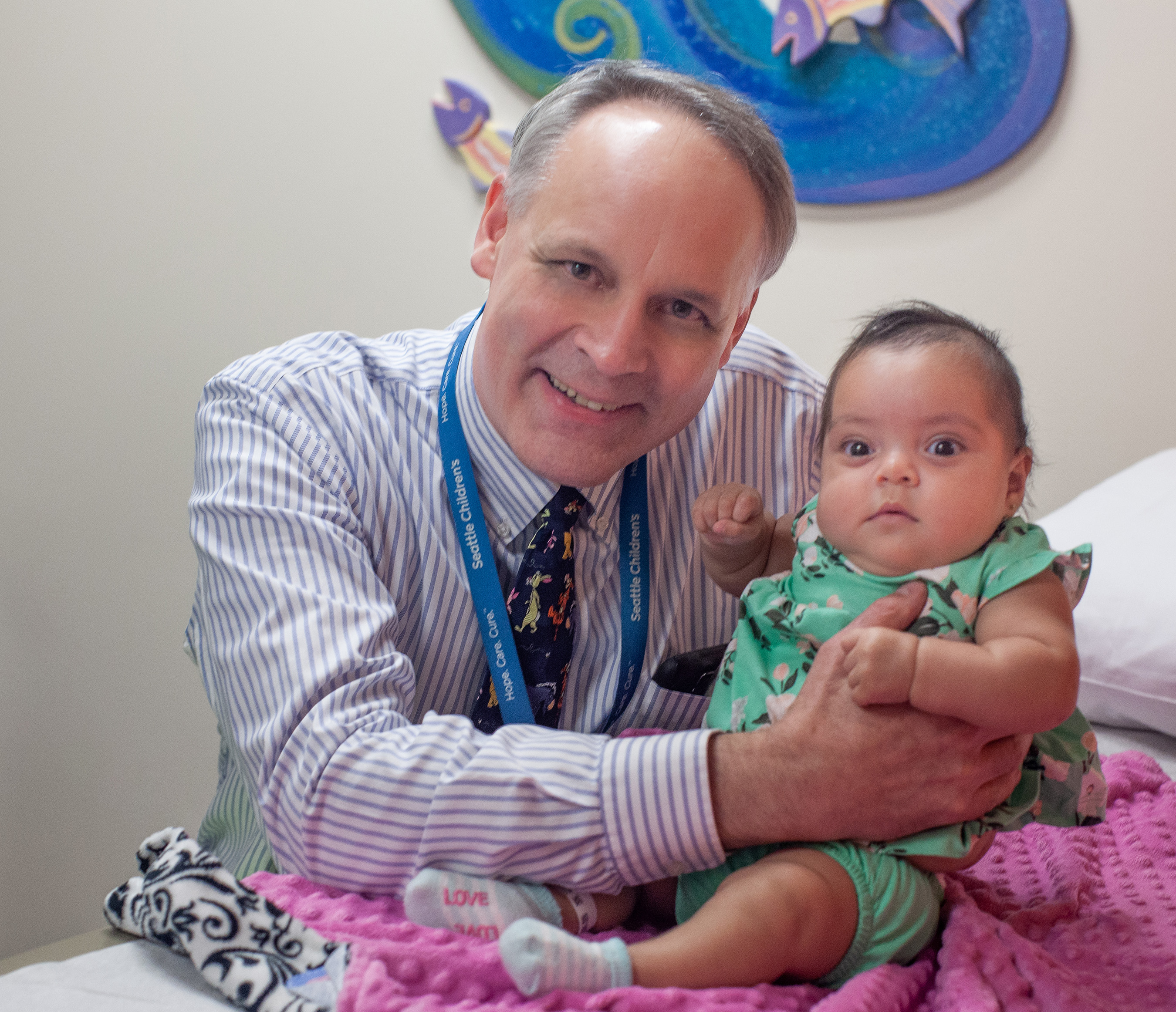 Aliyanna Martinez with Dr. Doug Hawkins, division chief of Hematology and Oncology at Seattle Children's.