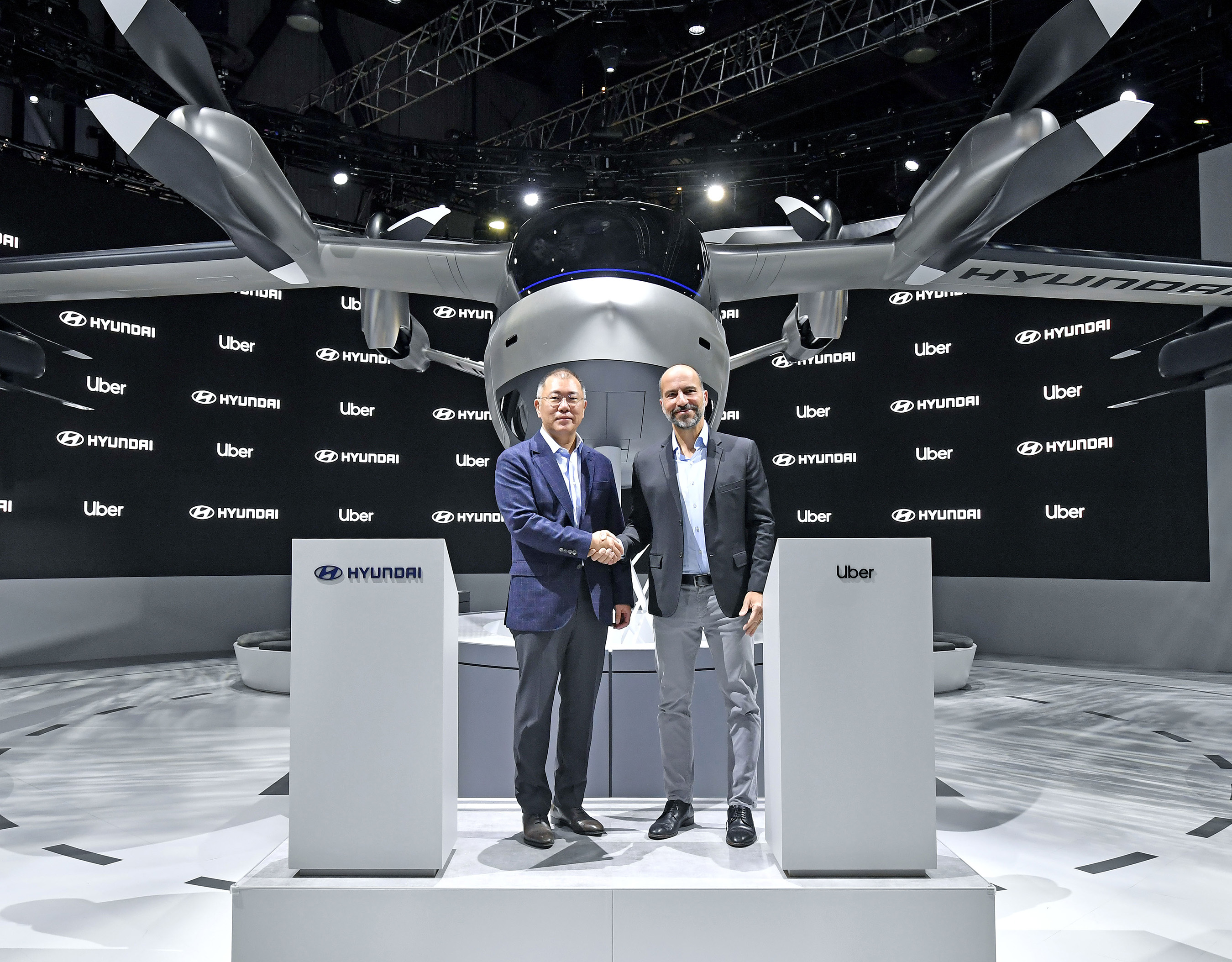 Hyundai Motor Company and Uber have announced a new partnership to develop Uber Air Taxis for a future aerial ride share network and unveiled a new full-scale aircraft concept at CES 2020. From left to right: Euisun Chung, Executive Vice Chairman of Hyundai Motor Group / Dara Khosrowshahi, CEO of Uber