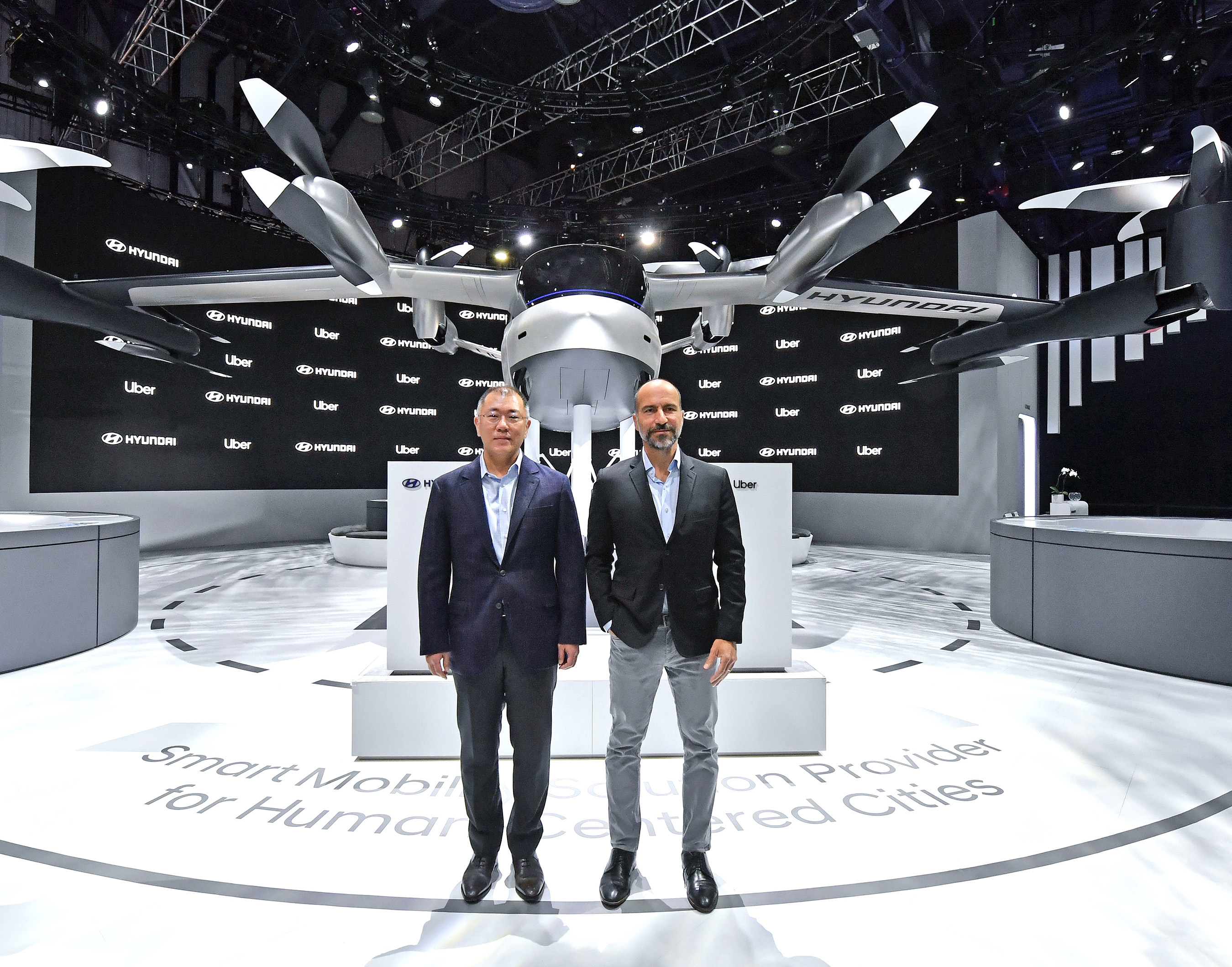 Hyundai Motor Company and Uber have announced a new partnership to develop Uber Air Taxis for a future aerial ride share network and unveiled a new full-scale aircraft concept at CES 2020. From left to right: Euisun Chung, Executive Vice Chairman of Hyundai Motor Group / Dara Khosrowshahi, CEO of Uber