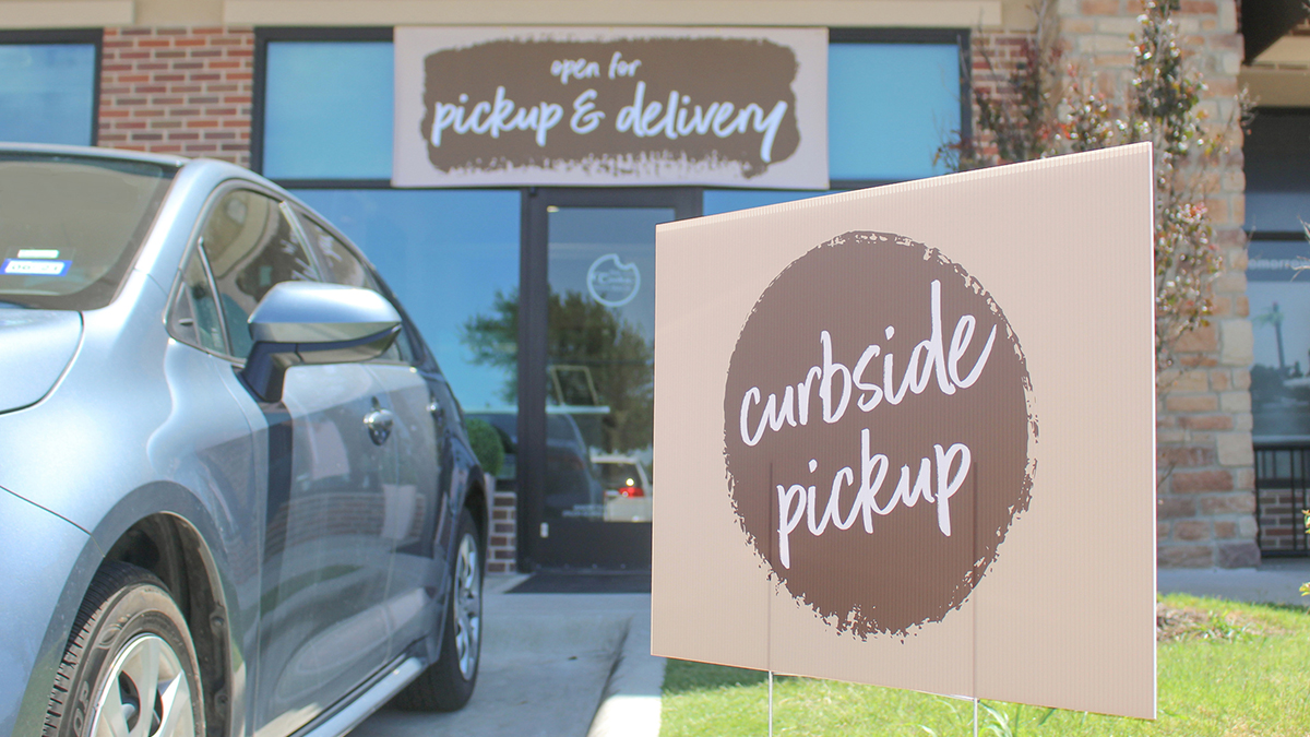Close up of curbside pickup sign