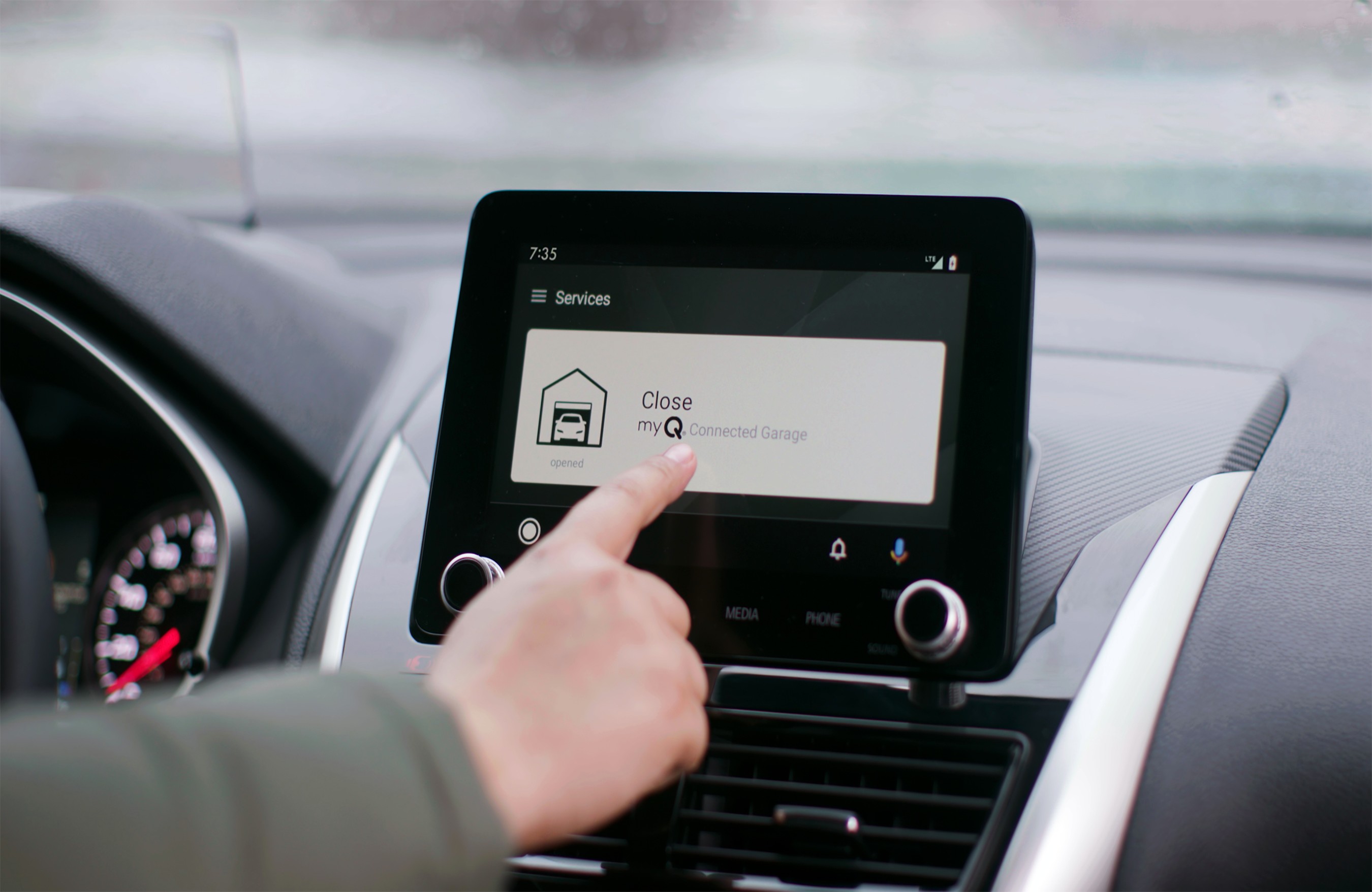 Safely open and close your garage door from anywhere with convenient in-dash touchscreen control.