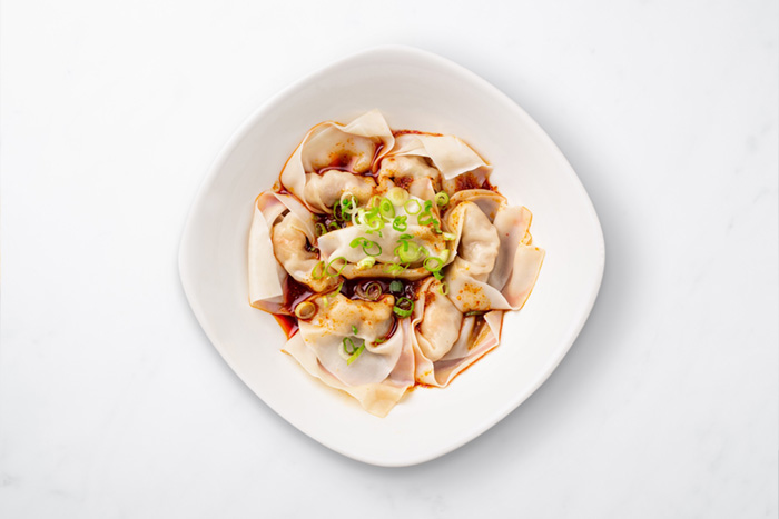 The Shrimp & Kurobuta Pork Wontons with are filled with freshly peeled shrimp and premium Kurobuta pork and finished with Din Tai Fung’s signature spicy sauce.