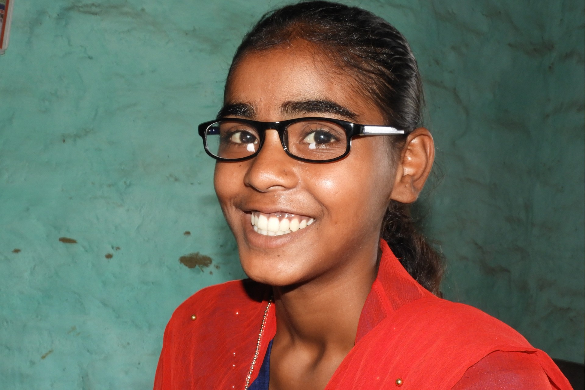 Khushi got an eye exam and new pair of glasses on an Orbis Vision Van in India. She no longer suffers from headaches and blurry vision and wants to join the police academy. Photo: Geoff Oliver Bugbee