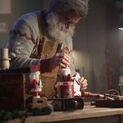 Santa working on a toy